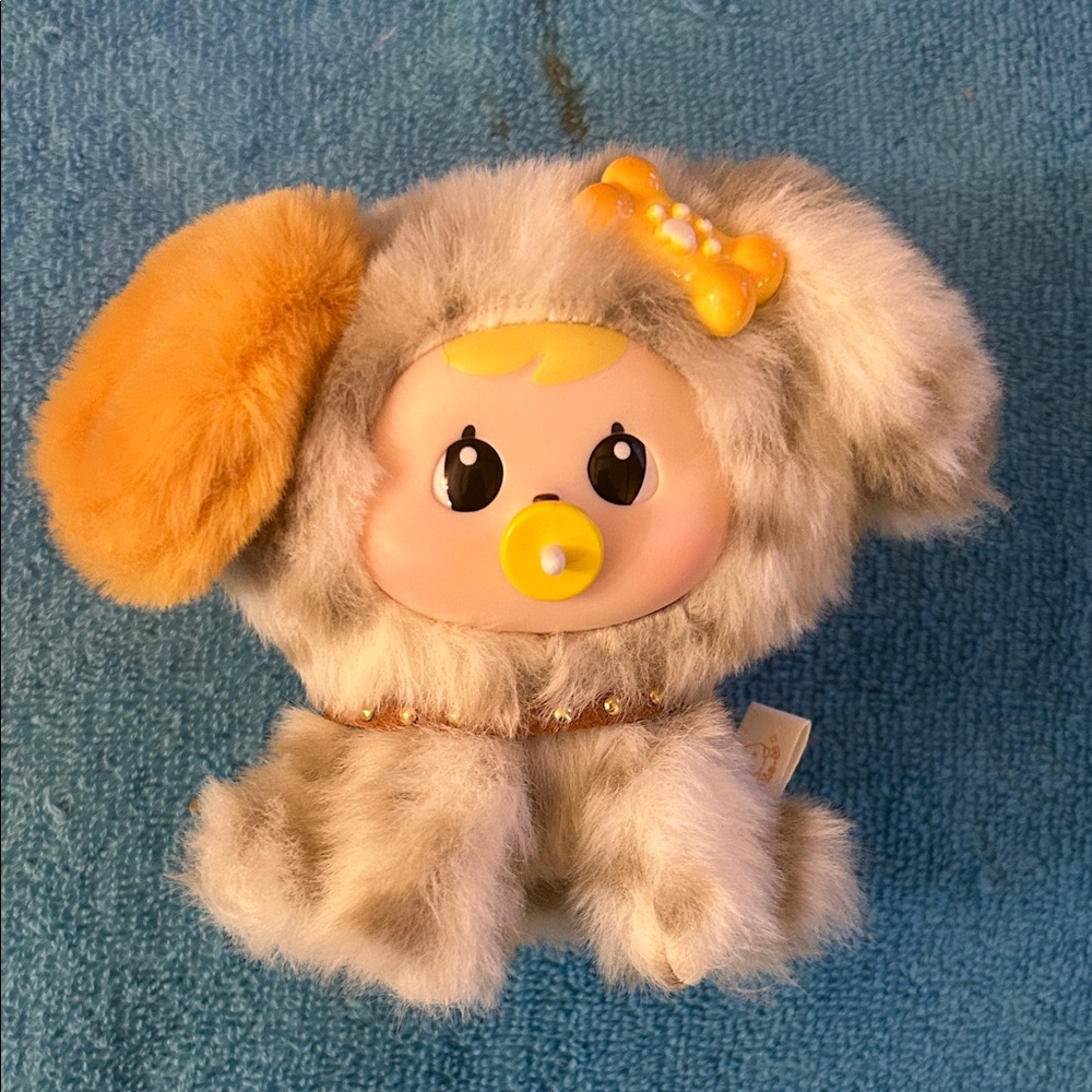 Charming Plush Puppy Toy with Orange and Gray Fur. Removable pacifier